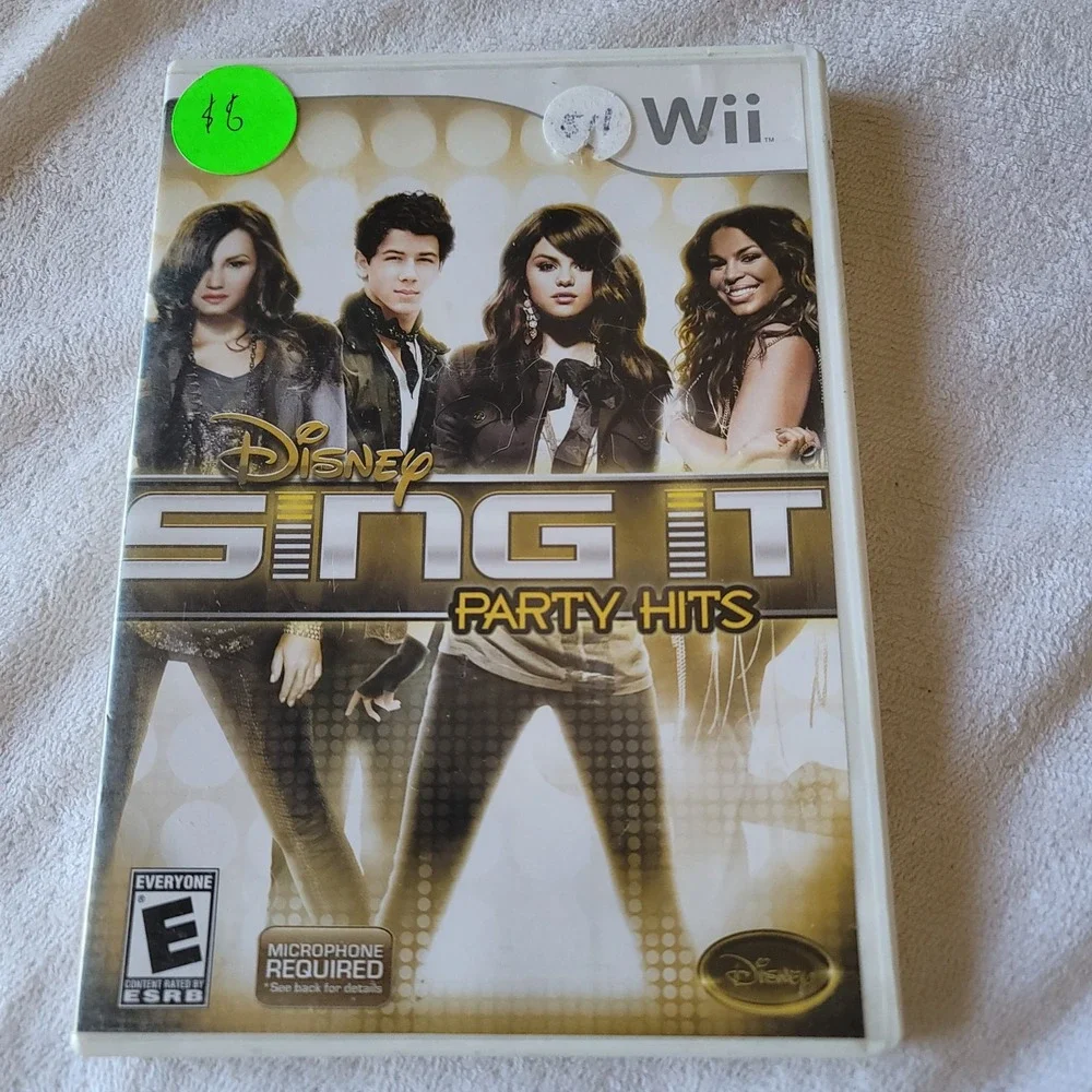 Nintendo Wii Disney Sing It Party Hits Adult Owned case/manual/disc